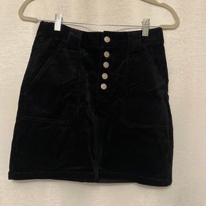 Black corduroy skirt, front and back pockets, size M